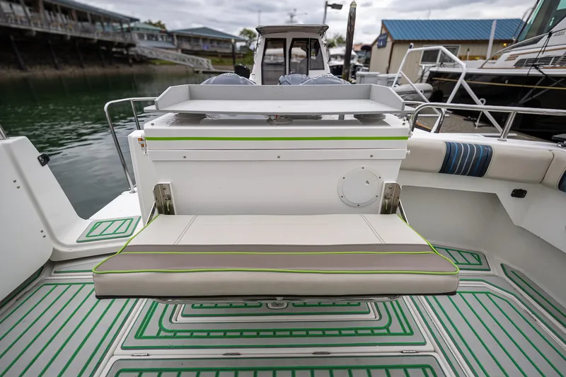 Slide: The Image of 2017 Cutwater C-302 Sport Coupe boat interior with seating and deck details. - 7