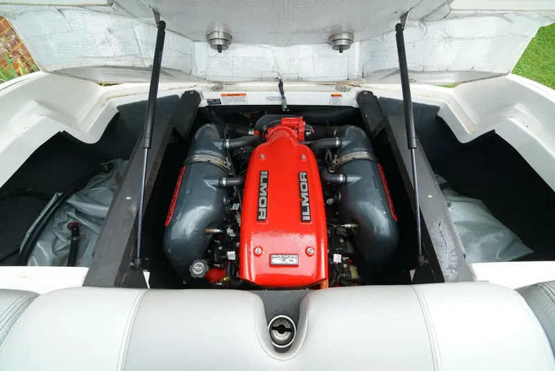 Slide: The Image of 2014 MasterCraft X-25 boat engine, featuring a red Ilmor V8 motor. - 44