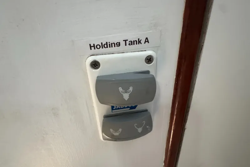 Slide: The Image of Control panel for Holding Tank A on 1981 Morgan 416 Out Island yacht. - 30