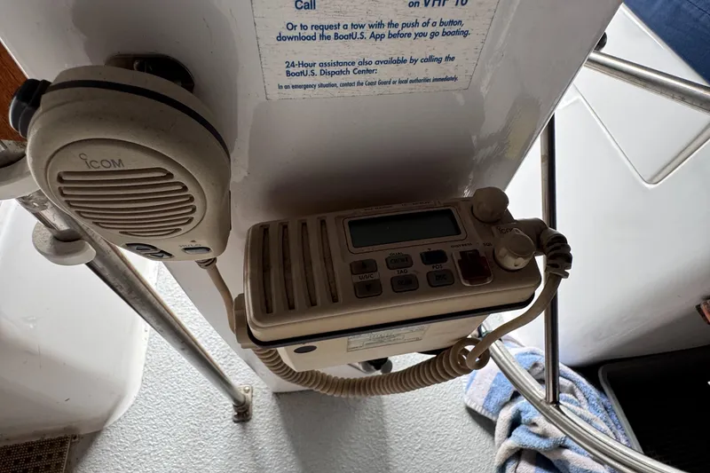 Slide: The Image of ICOM marine radio on 1981 Morgan 416 Out Island sailboat, mounted with microphone. - 43