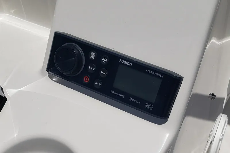 Slide: The Image of Fusion MS-RA70NSX audio system on 2022 Boston Whaler 170 Montauk boat console. - 37