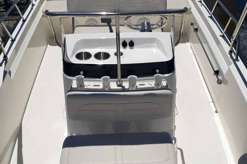 Slide: The Image of 2022 Boston Whaler 170 Montauk boat interior with steering console and seating. - 40