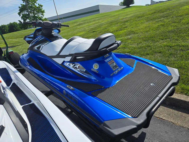 Slide: The Image of 2017 Yamaha WaveRunner VX Limited in blue, parked on grass. - 3