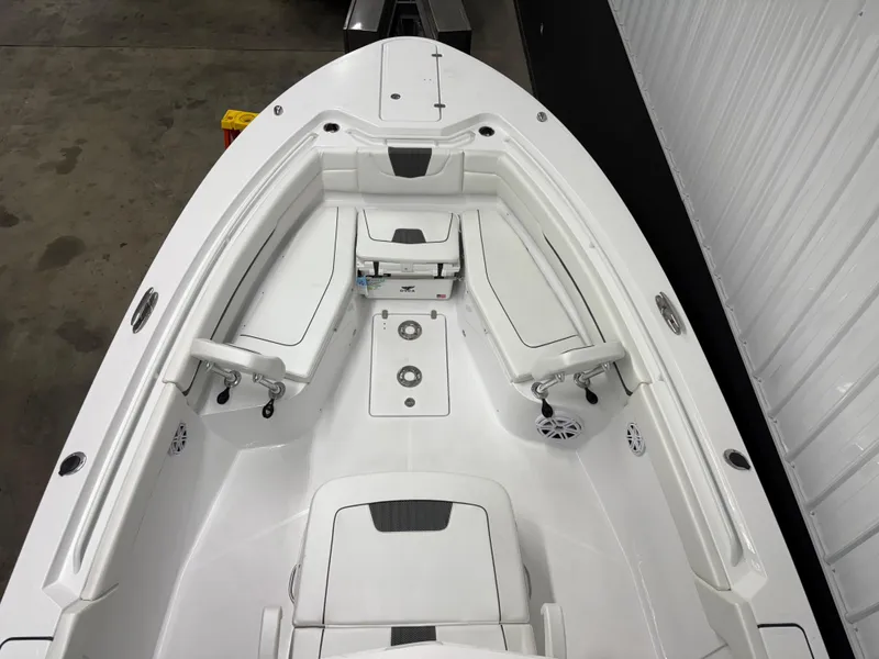 Slide: The Image of 2025 Wellcraft 352 Fisherman boat interior with white seating and modern design. - 3