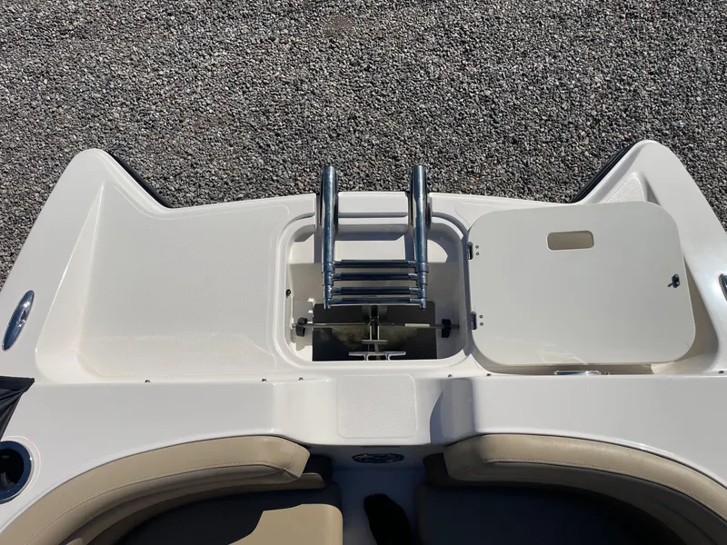 Slide: The Image of 2014 Starcraft Crossover 250 SCX IO boat with swim platform and ladder. - 6