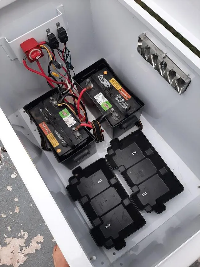 Slide: The Image of Battery compartment of 2010 Custom River Time Houseboat with wiring and connectors. - 3