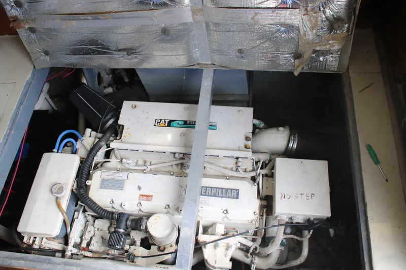 Slide: The Image of Engine compartment of a 1974 Viking Boats 40 Sport Fish with Caterpillar 3126 engine. - 12