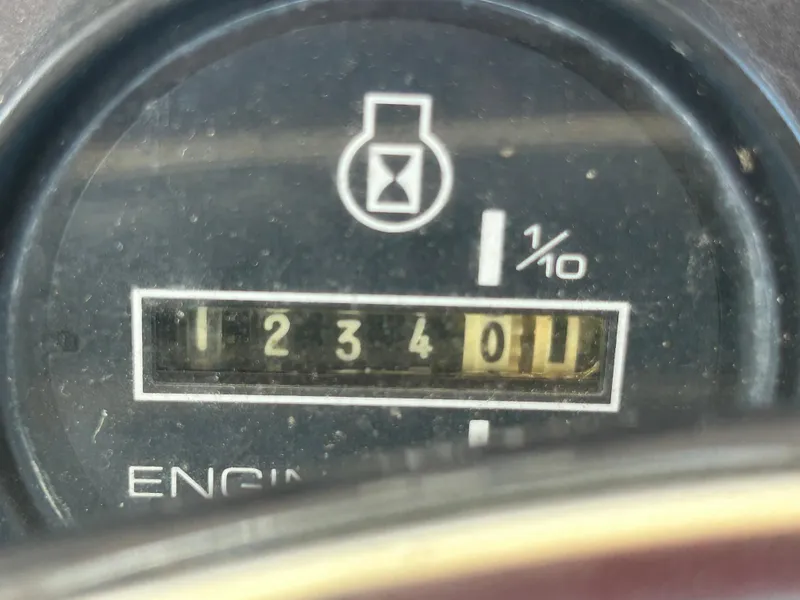 Slide: The Image of Close-up of engine hour meter reading 1234.1 on a 1974 Viking Boats 40 Sport fish. - 19