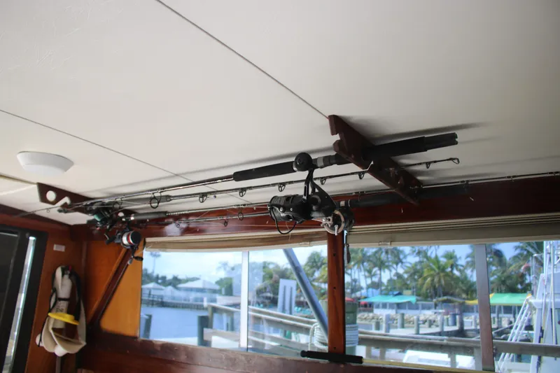 Slide: The Image of Interior of 1974 Viking Boats 40 Sport Fish with fishing rods mounted on ceiling. - 24