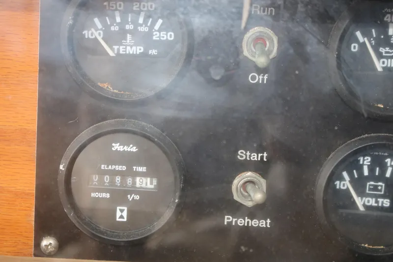 Slide: The Image of Close-up of 1974 Viking Boats 40 Sport Fish dashboard gauges and switches. - 3