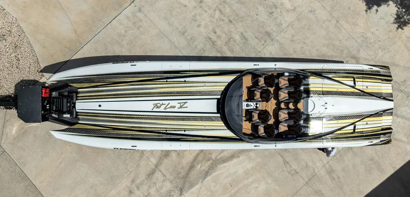Slide: The Image of Aerial view of 2017 MTI 48 speedboat with sleek design and seating arrangement. - 23