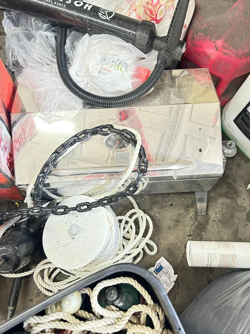 Slide: The Image of Boat equipment and accessories, including ropes and chains, for a 2021 Bennington L 24 Swingback. - 49