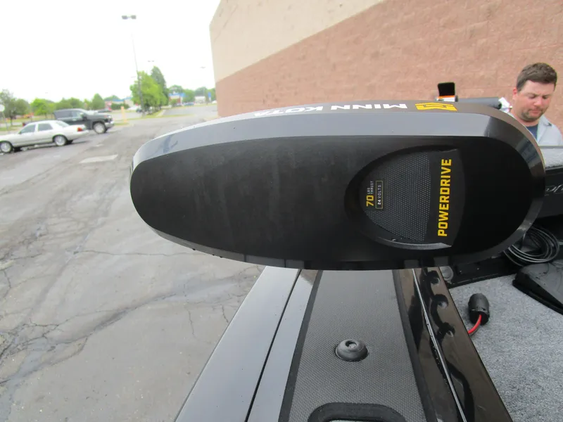 Slide: The Image of Minn Kota PowerDrive motor on 2026 Tracker Targa 18 WT boat in parking lot. - 15