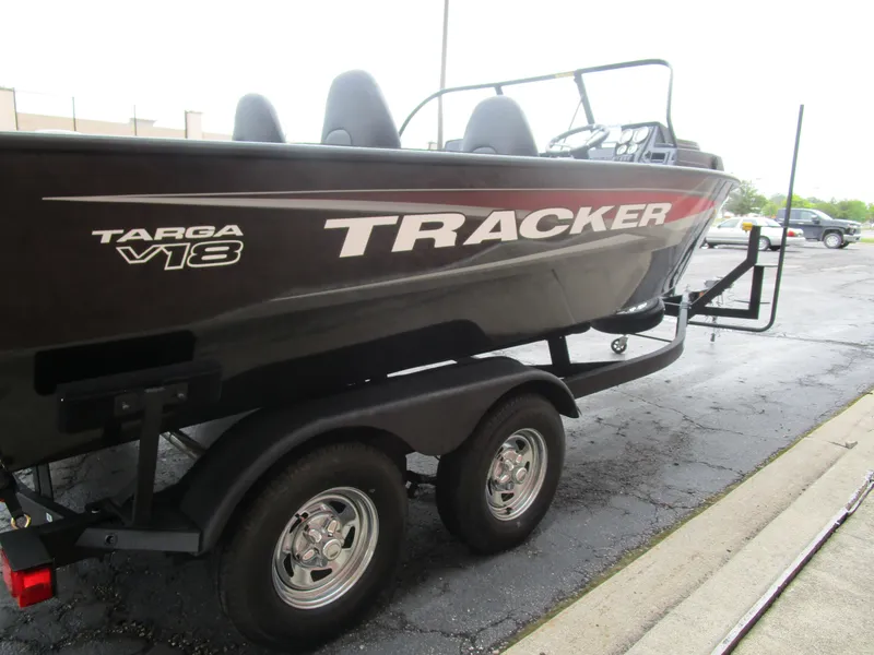 Slide: The Image of 2026 Tracker Targa 18 WT boat on trailer, parked outdoors. - 7