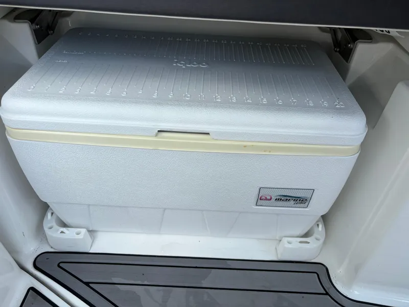Slide: The Image of White Igloo marine cooler on a 2020 Monterey M65 boat deck. - 11