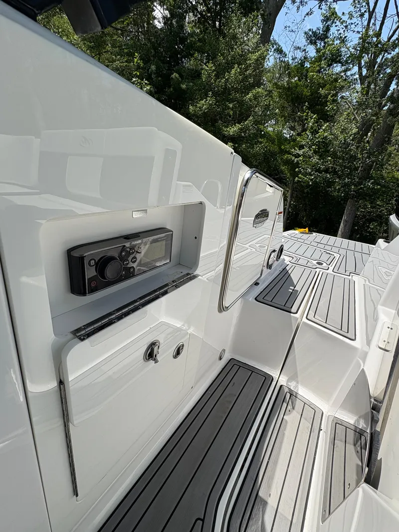 Slide: The Image of 2020 Monterey M65 boat interior with sleek design and modern control panel. - 4