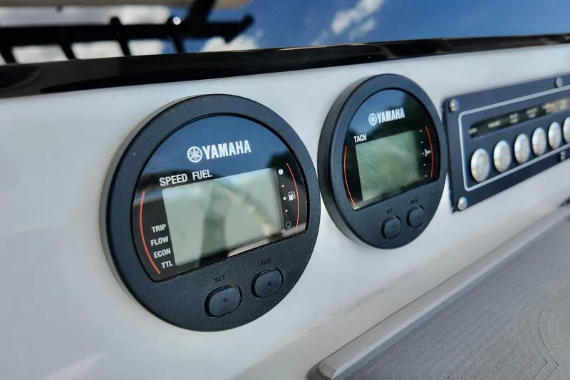 Slide: The Image of Yamaha gauges on 2026 Sea Fox 231 Bay Fox dashboard, displaying speed and tachometer. - 16
