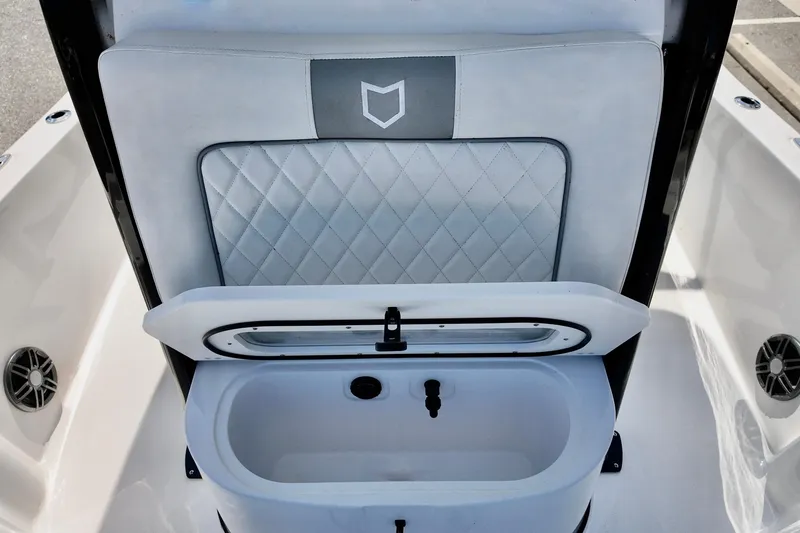 Slide: The Image of 2026 Sea Fox 231 Bay Fox boat seat with integrated storage compartment. - 9