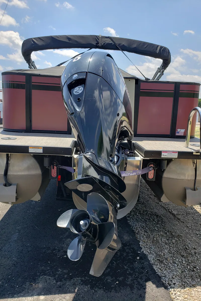 Slide: The Image of Rear view of 2022 Viaggio 20F pontoon boat with powerful outboard motor. - 1