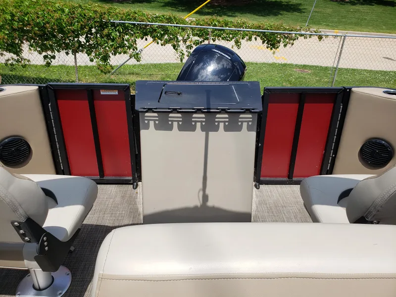 Slide: The Image of 2022 Viaggio 20F boat interior with seating and motor, featuring red and beige accents. - 3