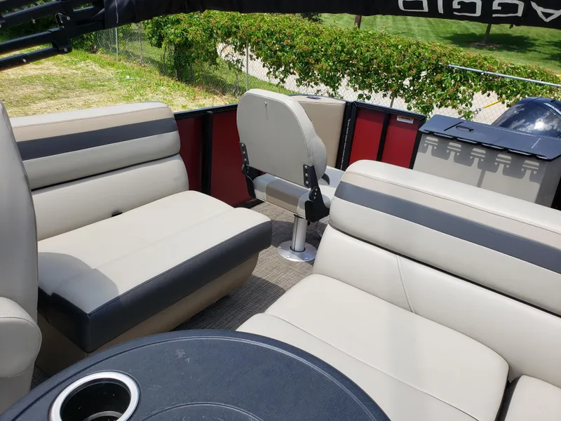 Slide: The Image of Interior of 2022 Viaggio 20F boat with beige seating and round table. - 4