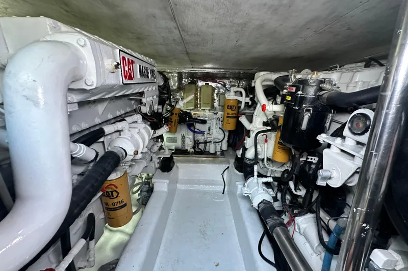 Slide: The Image of Engine room of 2005 Riviera 47 Open Flybridge with CAT marine engines and components. - 155