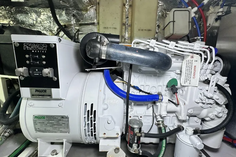 Slide: The Image of Phasor Marine generator in 2005 Riviera 47 Open Flybridge engine room. - 156