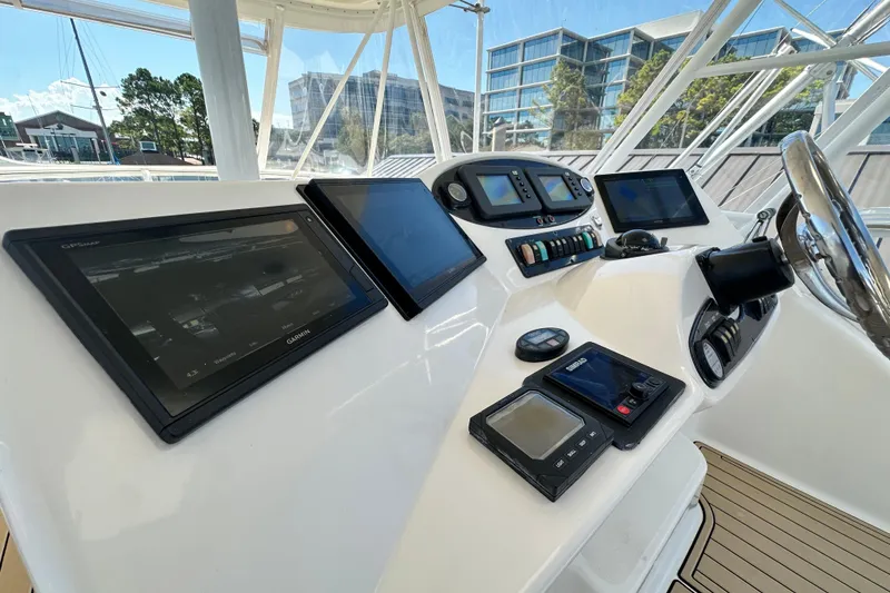 Slide: The Image of Control panel of 2005 Riviera 47 Open Flybridge with modern navigation equipment. - 29