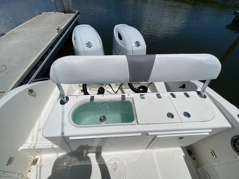 Slide: The Image of 2017 Century 2600 Center Console boat with dual engines and fishing station. - 16