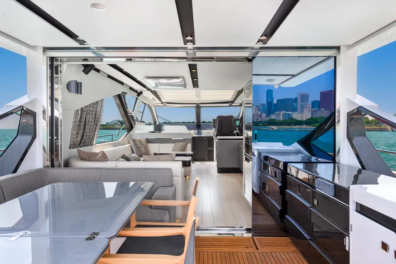 Slide: The Image of Luxurious interior of 2019 Azimut S7 yacht with city skyline view. - 12