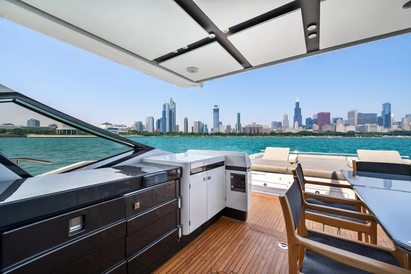 Slide: The Image of Luxurious 2019 Azimut S7 yacht interior with city skyline view. - 14