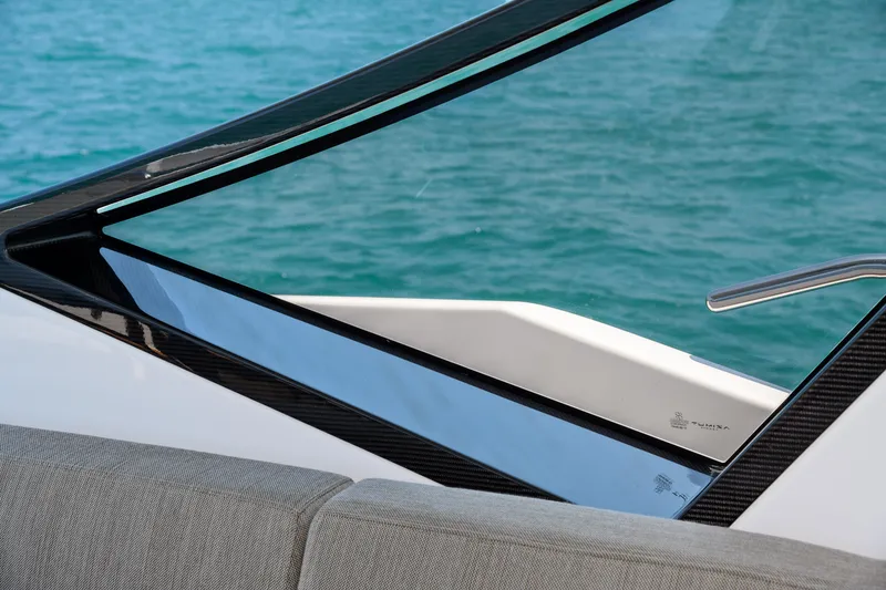 Slide: The Image of 2019 Azimut S7 yacht detail with sleek design and ocean backdrop. - 20