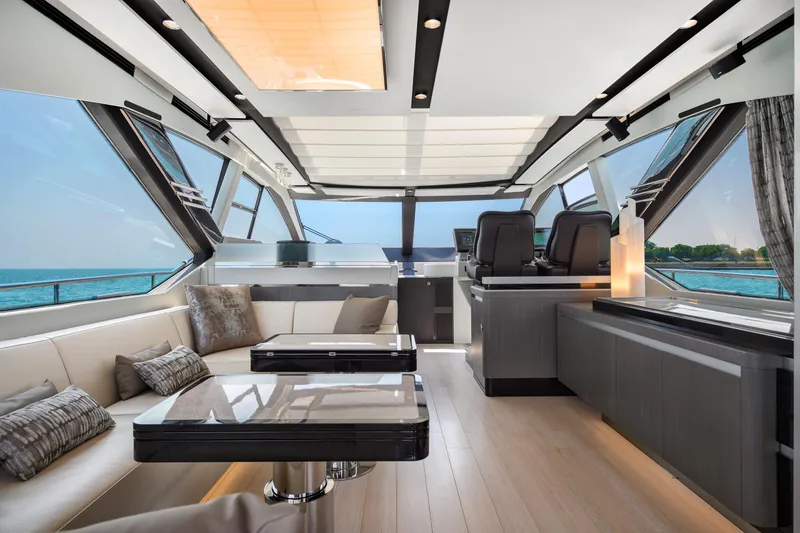 Slide: The Image of Luxurious interior of 2019 Azimut S7 yacht with modern seating and panoramic windows. - 22