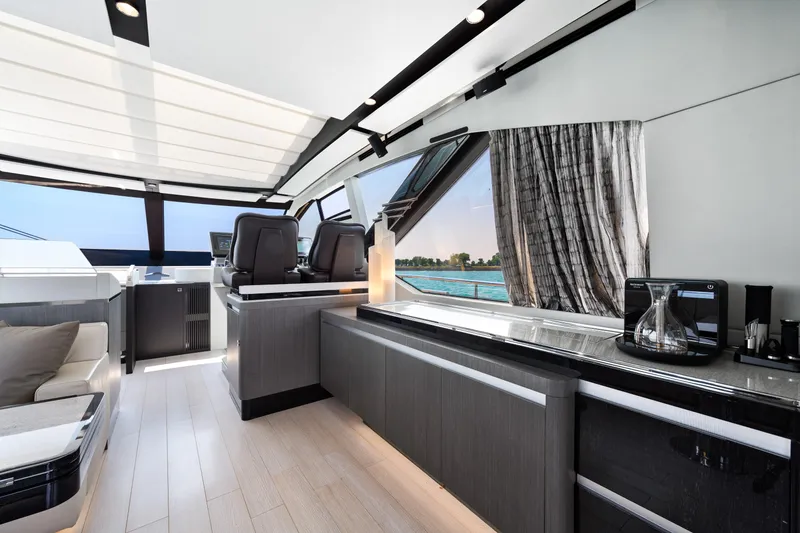Slide: The Image of Luxurious interior of 2019 Azimut S7 yacht with modern design and panoramic windows. - 24