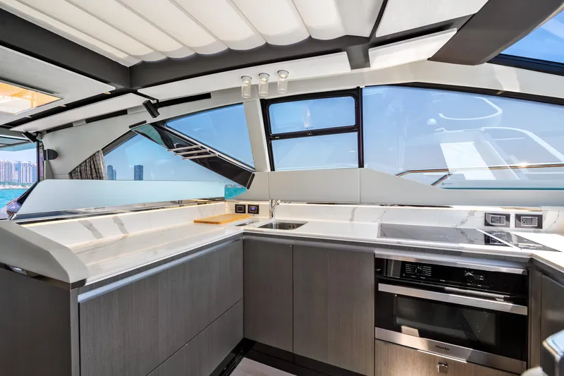 Slide: The Image of Luxurious interior of 2019 Azimut S7 yacht with modern kitchen design. - 32