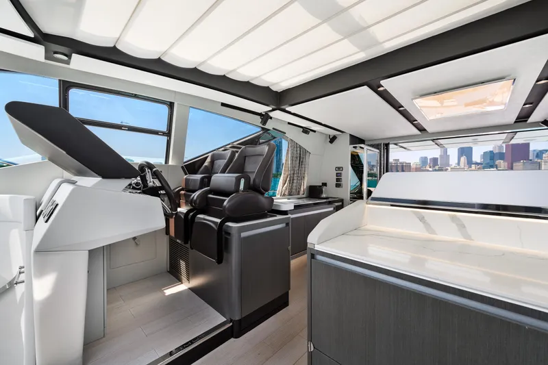 Slide: The Image of Luxurious interior of a 2019 Azimut S7 yacht with modern helm and seating. - 34