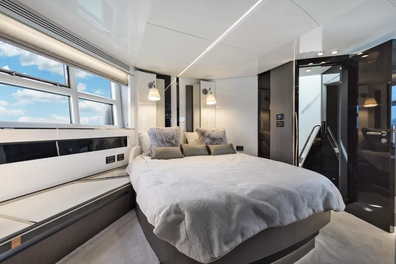 Slide: The Image of Luxurious bedroom interior of 2019 Azimut S7 yacht with modern design and large windows. - 42
