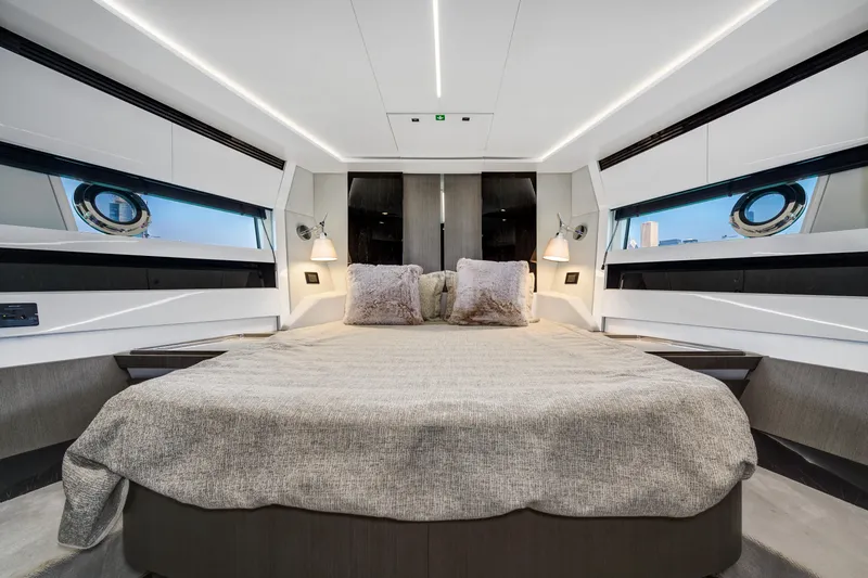 Slide: The Image of Luxurious bedroom interior of 2019 Azimut S7 yacht with modern design and cozy bedding. - 48