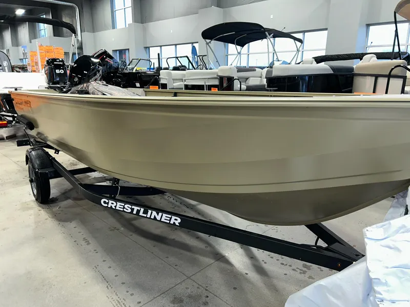 Slide: The Image of 2023 Crestliner 1650 Discovery Tiller boat on trailer in showroom. - 5