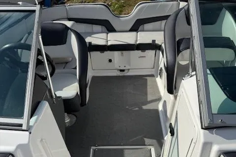 Slide: The Image of 2015 Yamaha Boats SX210 interior with seating and steering wheel. - 11