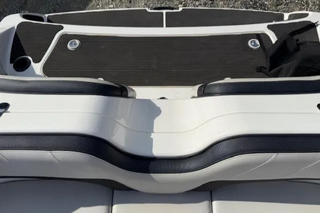 Slide: The Image of 2015 Yamaha Boats SX210 swim platform with black and white seating. - 14