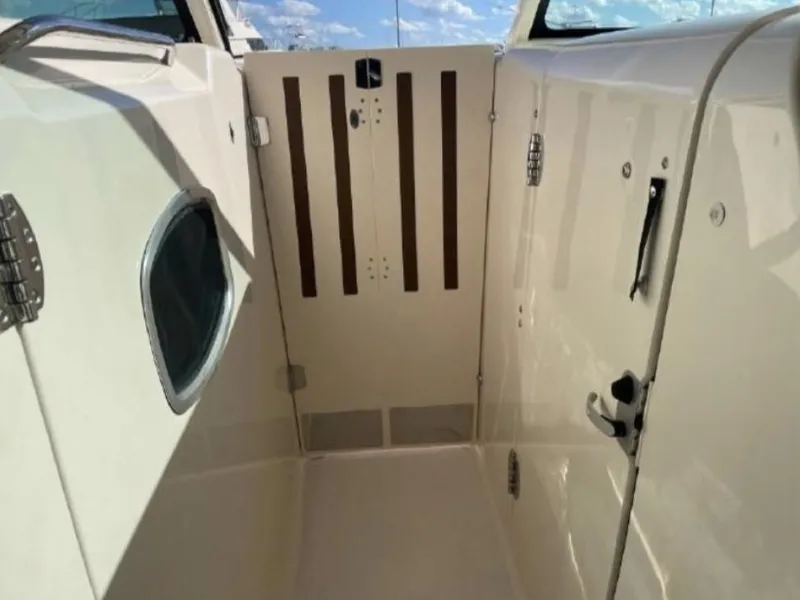 Slide: The Image of 2019 Grady-White Freedom 375 boat interior with sleek design and modern fixtures. - 27