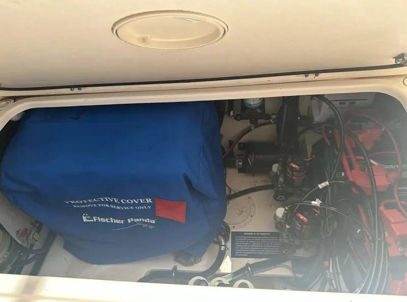 Slide: The Image of Engine compartment of 2019 Grady-White Freedom 375 with Fischer Panda generator cover. - 30
