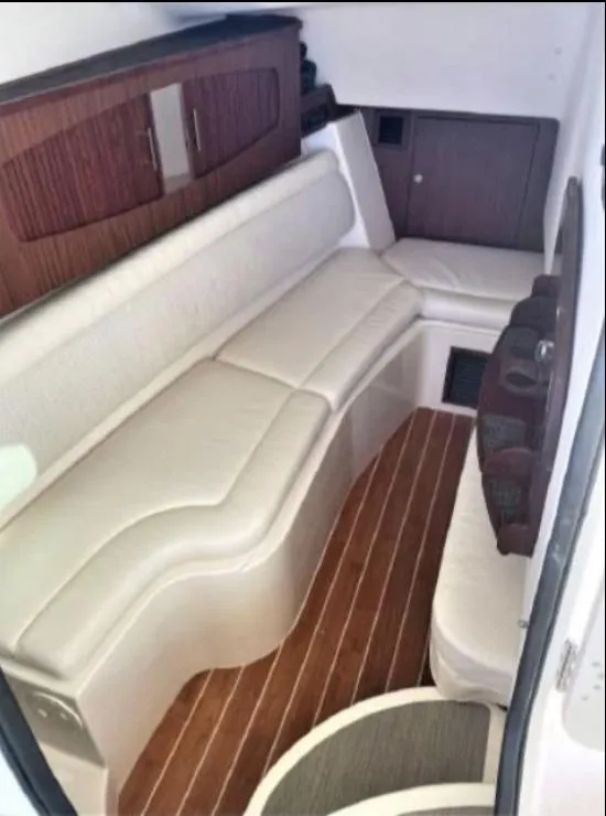 Slide: The Image of 2019 Grady-White Freedom 375 interior with white seating and wood accents. - 46