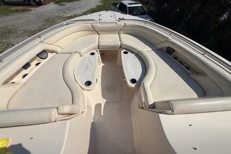 Slide: The Image of 2019 Grady-White Freedom 375 boat interior with spacious seating and cup holders. - 56