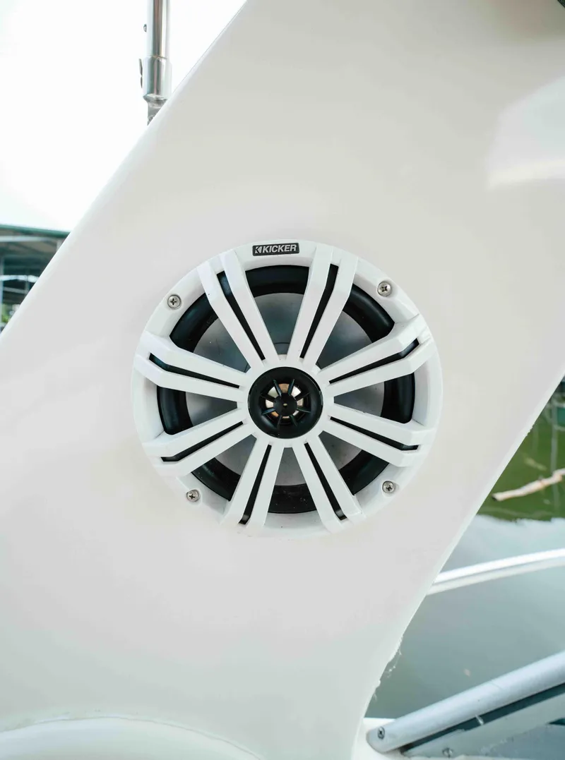 Slide: The Image of Kicker speaker on 2000 Sea Ray 340 Sundancer boat, white exterior. - 20