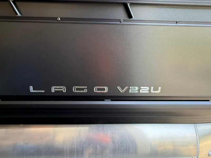 Slide: The Image of 2025 Viaggio Lago V-U logo on sleek black surface. - 10