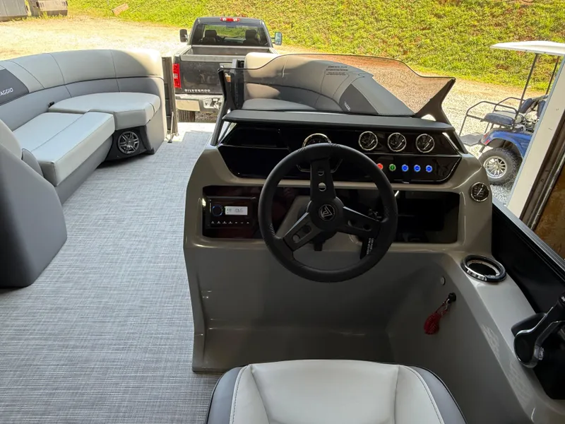 Slide: The Image of Interior view of 2025 Viaggio Lago V-U boat with modern dashboard and seating. - 11