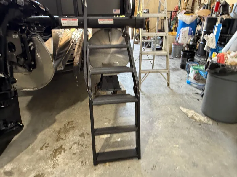 Slide: The Image of Ladder setup for Viaggio Lago V-U 2025 in a cluttered garage environment. - 15