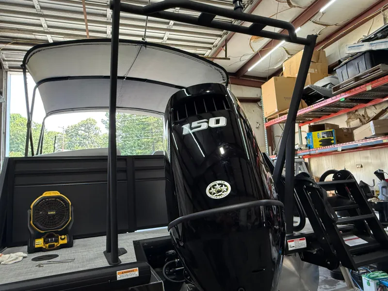 Slide: The Image of 2025 Viaggio Lago V-U boat with 150 HP engine in a workshop setting. - 20